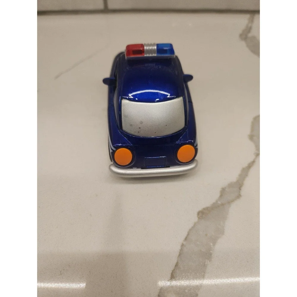 Junye Toys Police Car Sticks tongue out, moves‎ eyes
